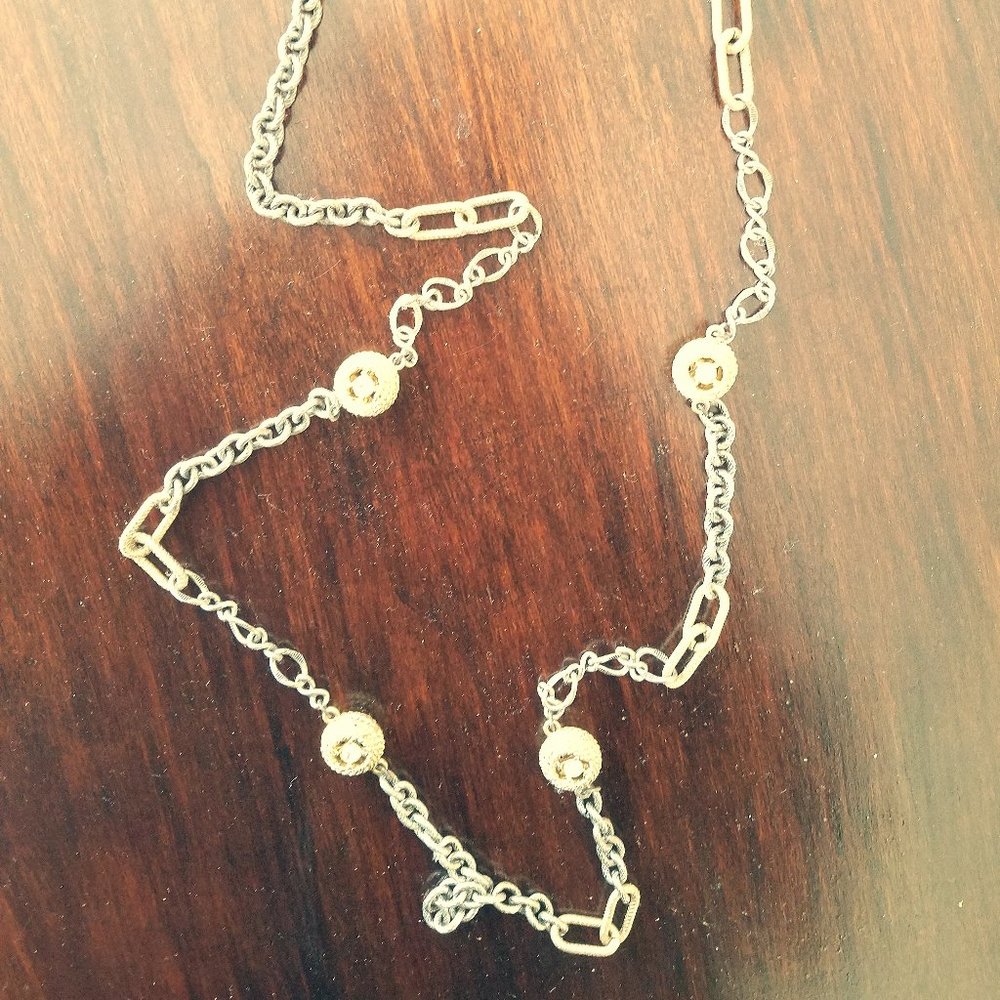 Long-chained silver and gold necklace